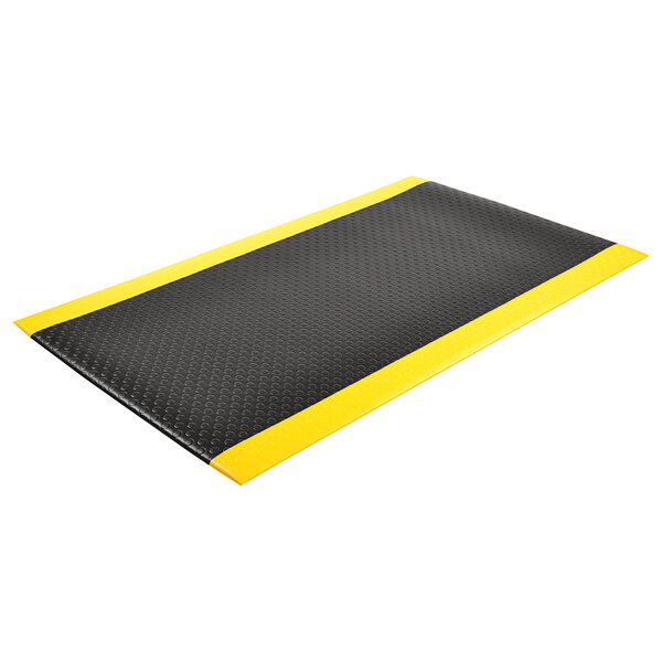 A black and yellow Notrax Bubble Sof-Tred anti-fatigue mat with a black border.