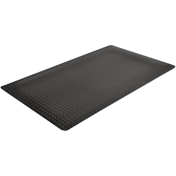 A black rubber Notrax Dura Trax Grande anti-fatigue mat with a patterned design.