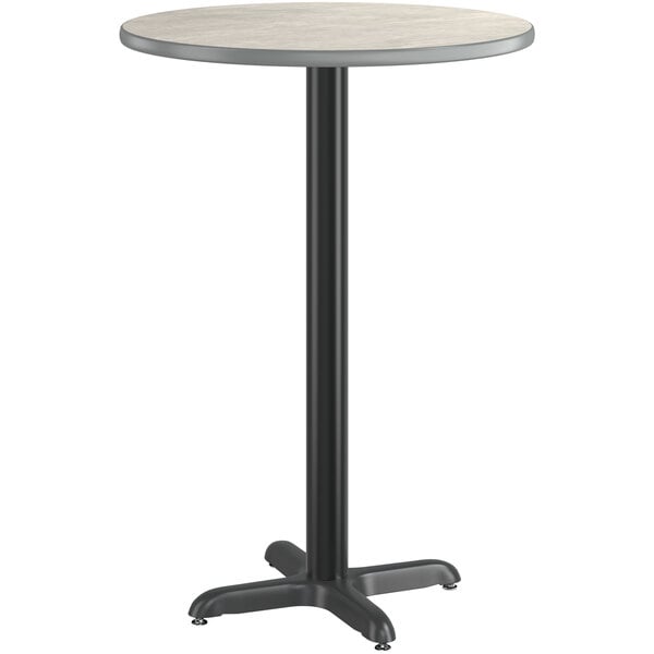 A Lancaster Table & Seating round table with a slate gray top and black base.