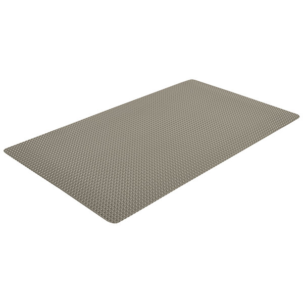 A grey rectangular Notrax Bubble Trax mat with a grid of holes.