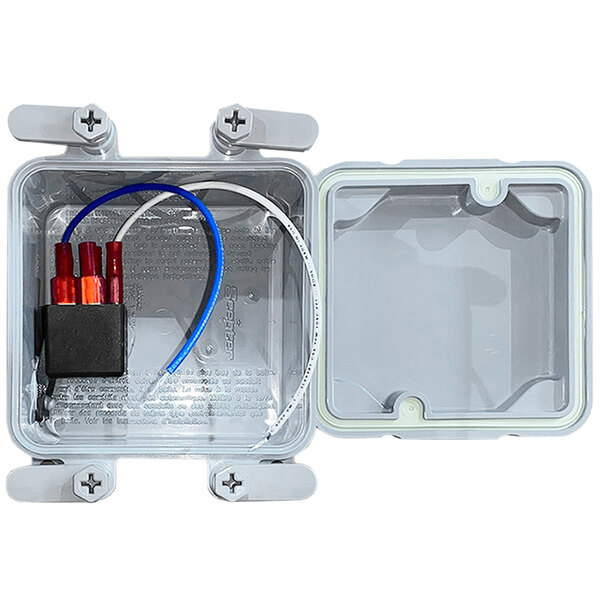 A white plastic box with wires inside.