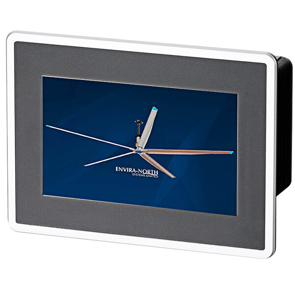 A white and blue clock with a picture of a windmill on the face.
