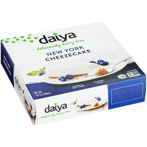 A box of Daiya New York-Style Vegan Cheesecake on a table.