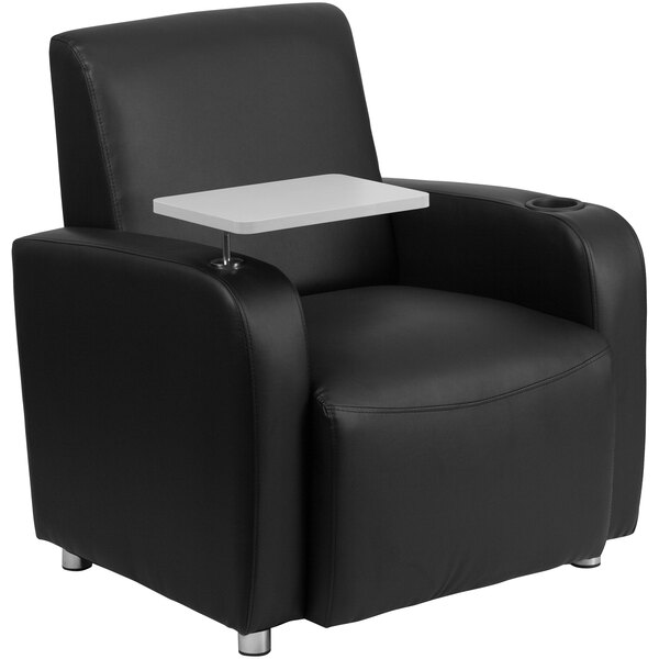 A Flash Furniture black leather guest chair with a tablet arm and cup holder on a white tray on a black surface.