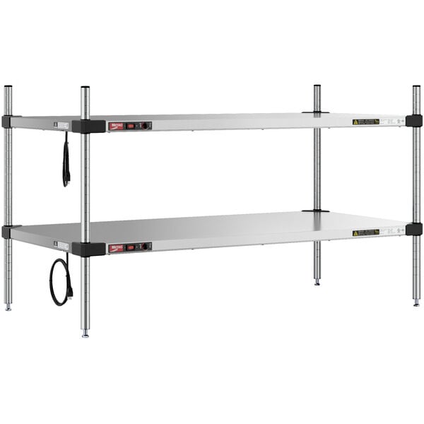 A Metro Super Erecta stainless steel heated countertop takeout station with two shelves and black wires.