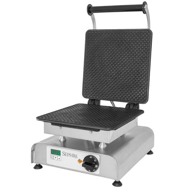 A Sephra commercial waffle cone maker with a black square surface and handle.