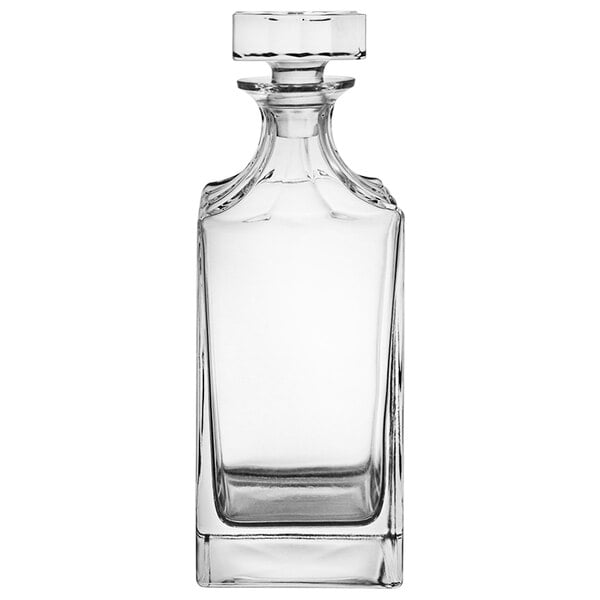 A Franmara clear glass square decanter with a crystal stopper.