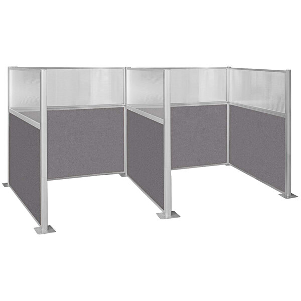 A Versare Hush Panel double cubicle with window partitioned into three sections.