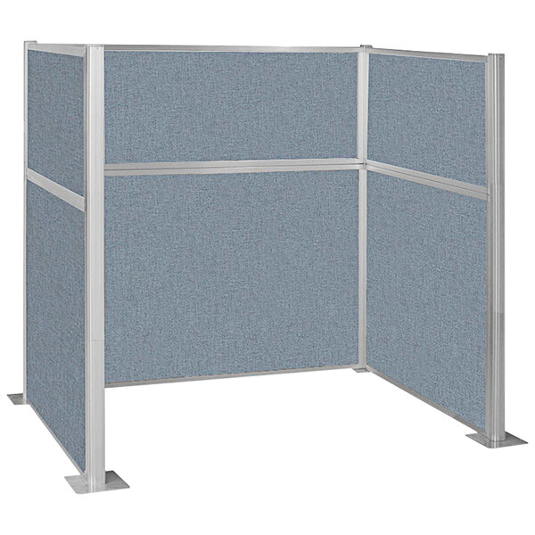A Versare Hush Panel U-shape cubicle with powder blue panels and metal legs.
