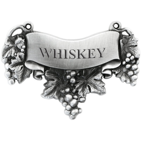 A silver Franmara whiskey decanter label with grapes and text.