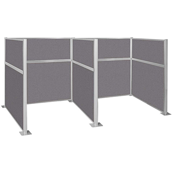 A Versare Hush Panel double cubicle with grey fabric panels.
