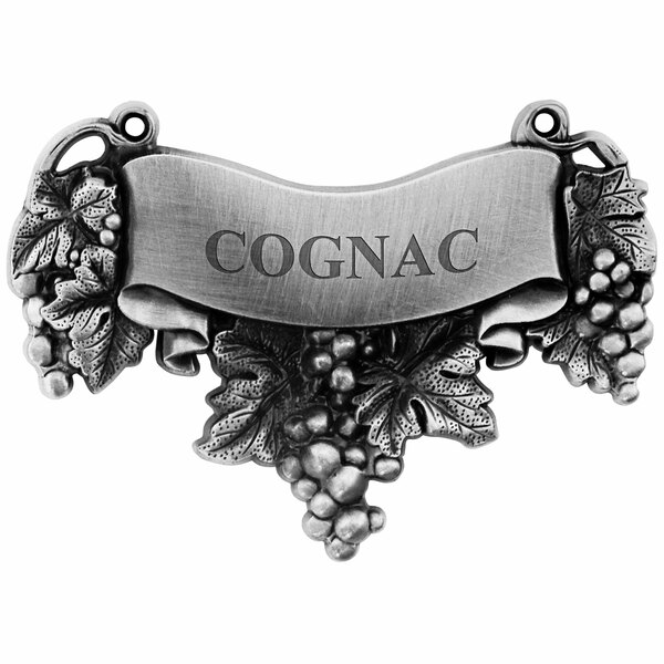 A silver Franmara decanter label with grapes and the word "Cognac"