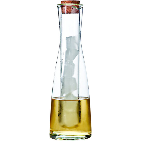 A Franmara glass carafe with ice and water inside.