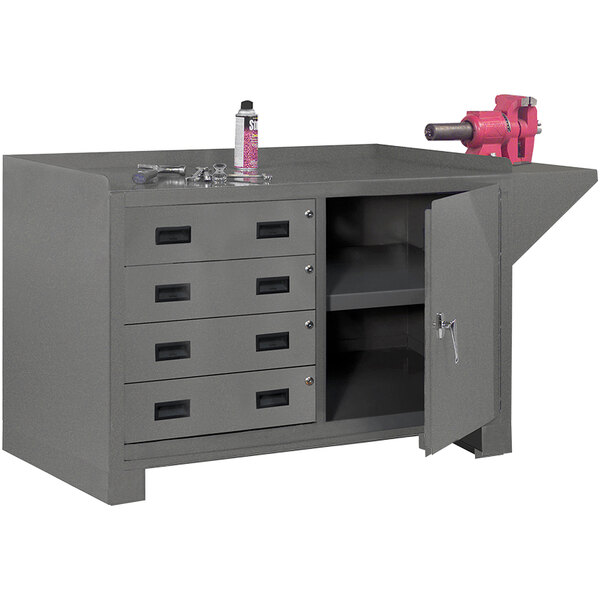 A grey metal workbench with a pink tool drawer.