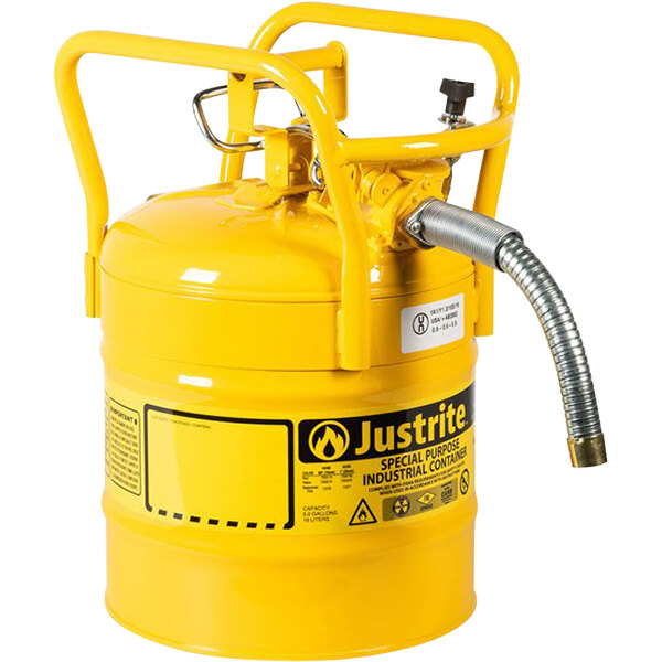 A yellow metal cylinder with a hose attached.