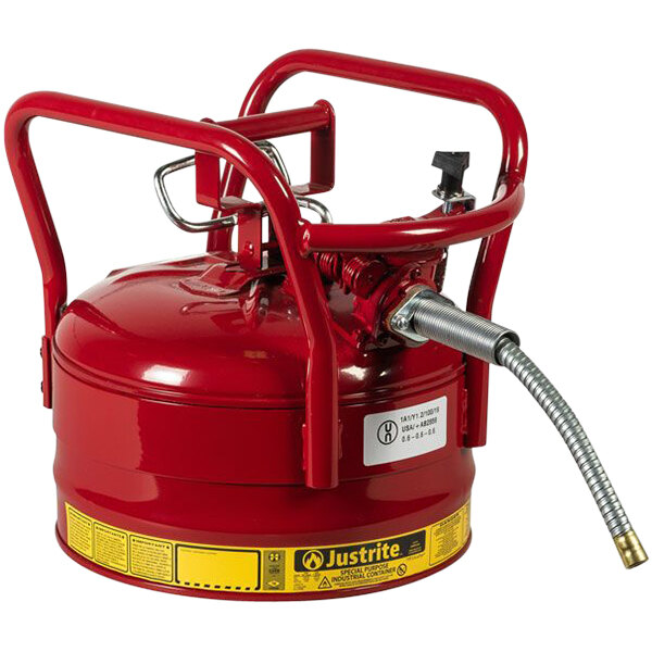 A red metal container with a hose attached.