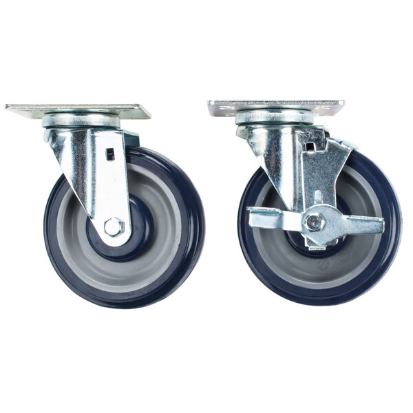 A set of four Cooking Performance Group casters with black rubber wheels.