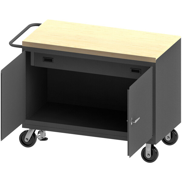A black cart with a wooden top and doors and a drawer.