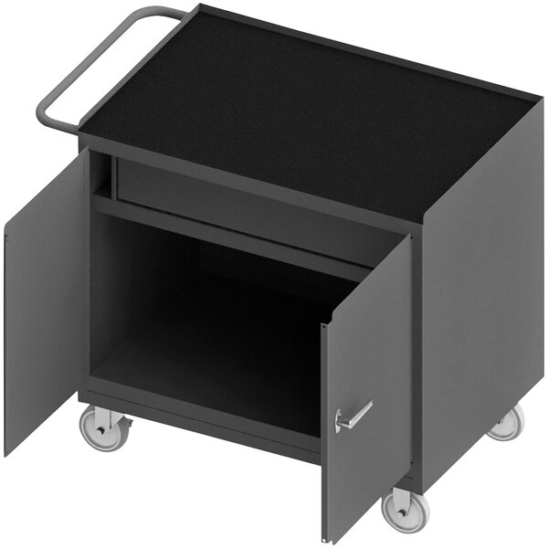 A black cart with a door and drawer open on wheels.