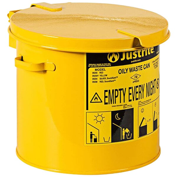 A yellow Justrite countertop oily waste can with a lid.