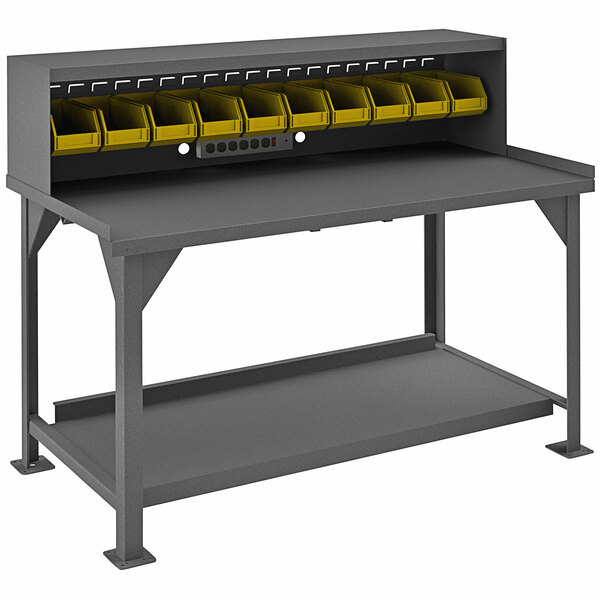 A grey Durham Manufacturing workbench with yellow riser shelves and a power strip.
