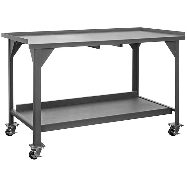 A gray metal work table with wheels.