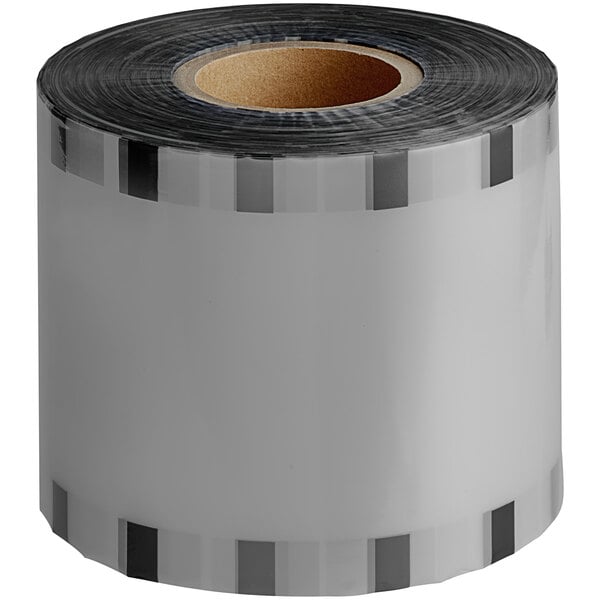A roll of clear tape with black and white stripes.