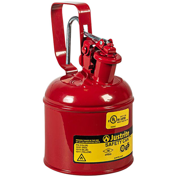 A red Justrite safety canister with a yellow trigger handle.