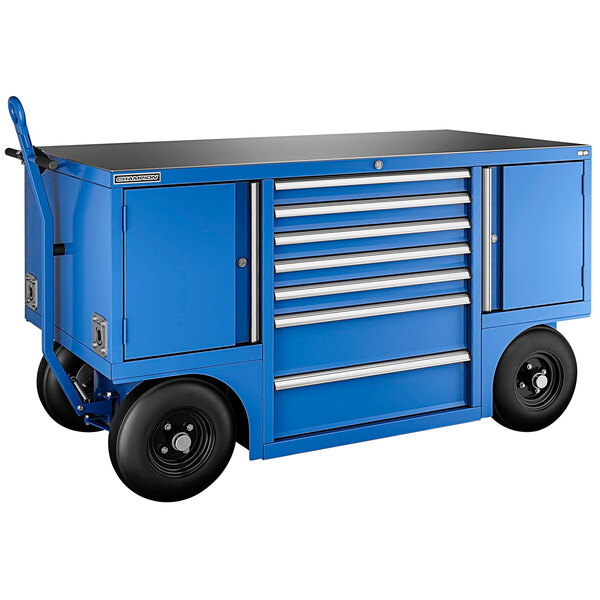 A blue Champion Tool Storage mobile workshop with drawers and lockers on wheels.