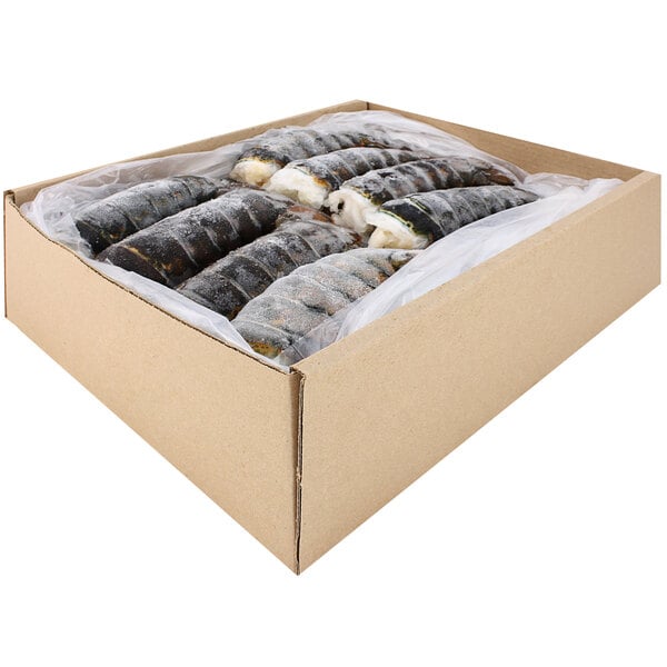 A white box of frozen 6-7 oz. North Atlantic Lobster tails.