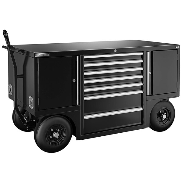 A black Champion Tool Storage mobile workshop with drawers and lockers on wheels.