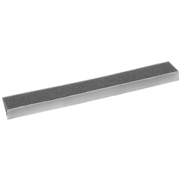 A grey rectangular gasket with a black and grey edge.