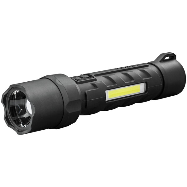 A black Coast Polysteel 700 flashlight with a yellow light.