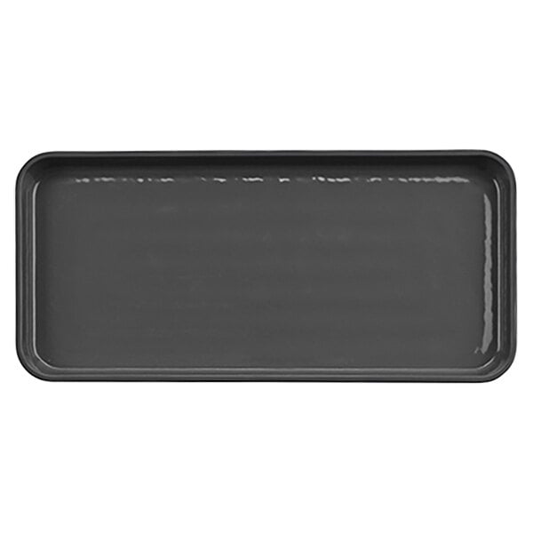 A gray rectangular tray with a black surface.