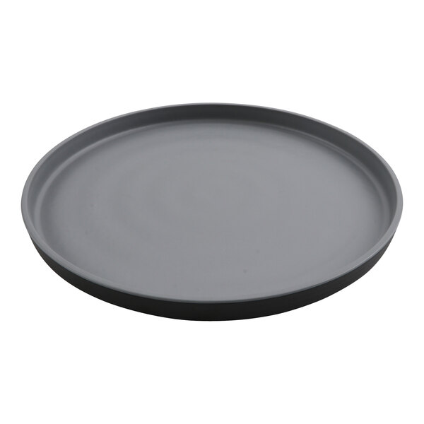 A round grey plate with a black rim.