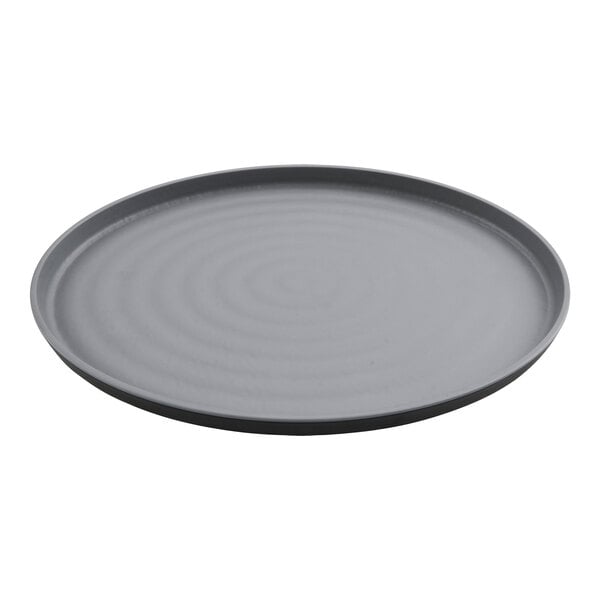 A round gray plate with a black rim.