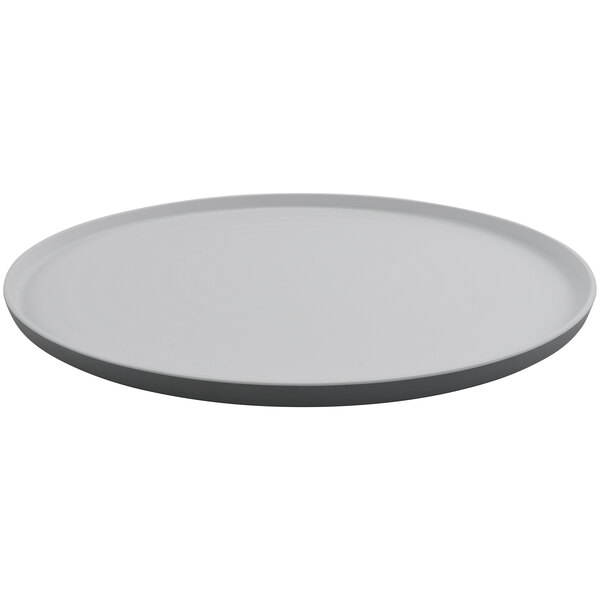A white plate with a gray rim.