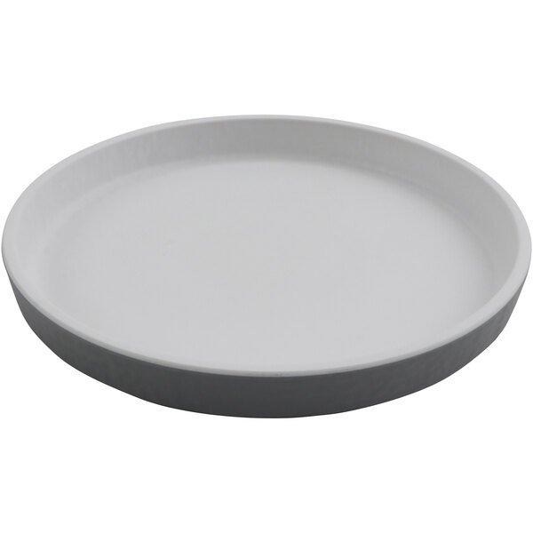 A gray melamine plate with a black rim.