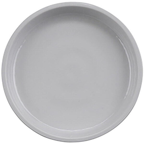 A white GET Roca melamine plate with a rim.