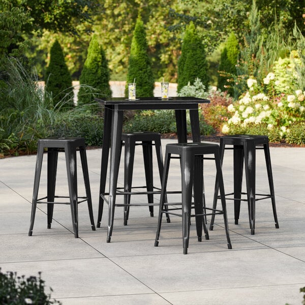 Lancaster Table & Seating Alloy Series 31 1/2" x 31 1/2" Distressed Black Bar Height Outdoor Table with 4 Backless Barstools