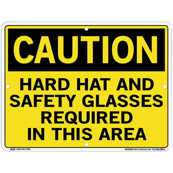 A yellow and black aluminum composite sign that says "Caution: Hard Hat and Safety Glasses Required" by Vestil.