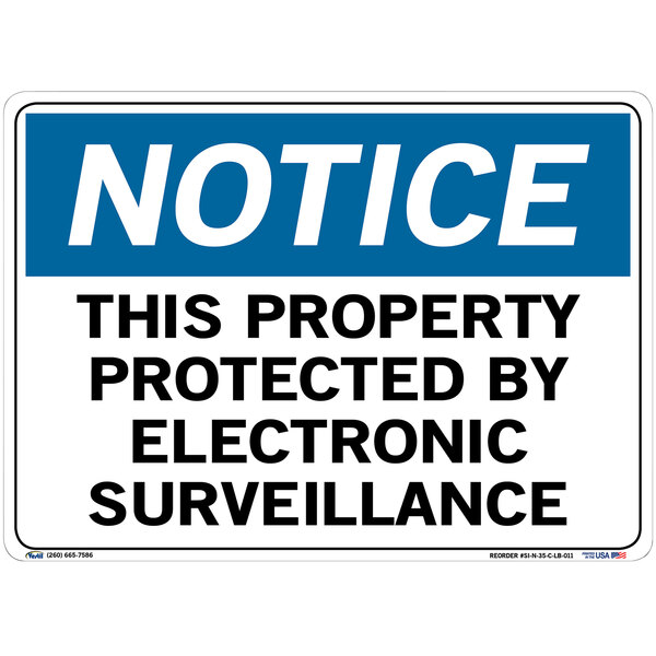 A white and blue Vestil vinyl sign with black text that says "Notice / This Property Protected By Electronic Surveillance"