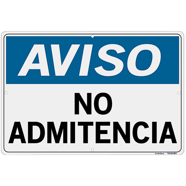 A blue and white Vestil aluminum warehouse sign with the words "Aviso / No Admitencia" in white.
