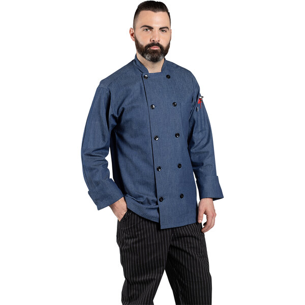 A man wearing a blue Uncommon Chef coat.
