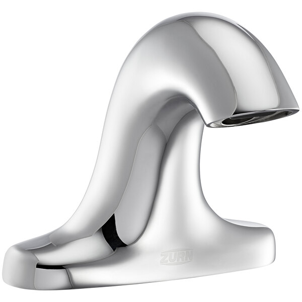 A silver Zurn deck mount sensor faucet with a cast spout.