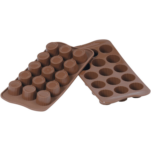 A close-up of a Silikomart Praline Brown silicone chocolate mold with 15 compartments.