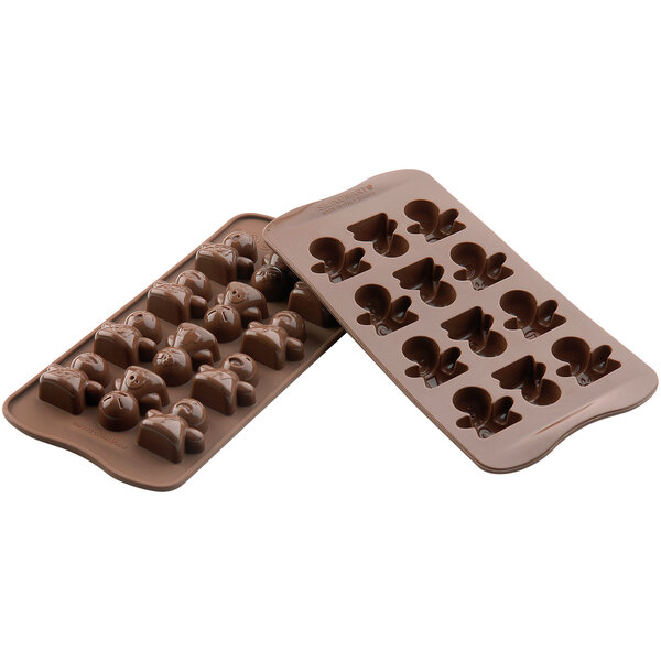 A Silikomart silicone chocolate mold with different shapes.