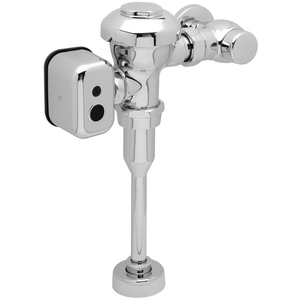 A Zurn chrome-plated urinal flush valve with a hardwired automatic sensor.