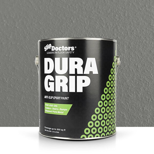 A black and white SlipDoctors Dura Grip paint can with white text and green circles.