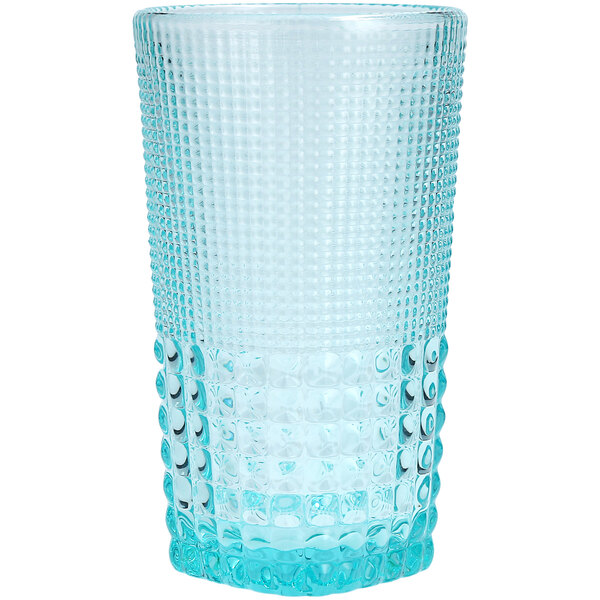 A close up of a Fortessa Pool Blue Beverage Glass with a textured pattern.